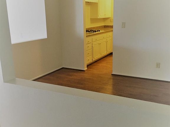 From Entry looking through dining room into kitchen