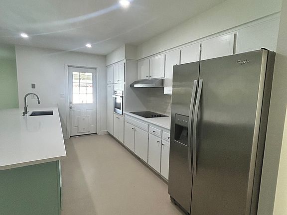 Kitchen with stainless steel appliances
