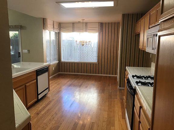 Kitchen is open to Family Rm