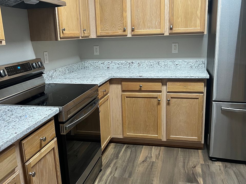 Kitchen with new range hood and range with large oven