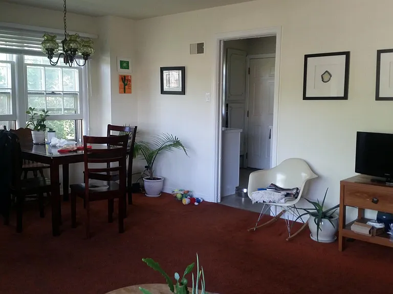 Lots of light in the living room. New carpet scheduled in between tenants.
