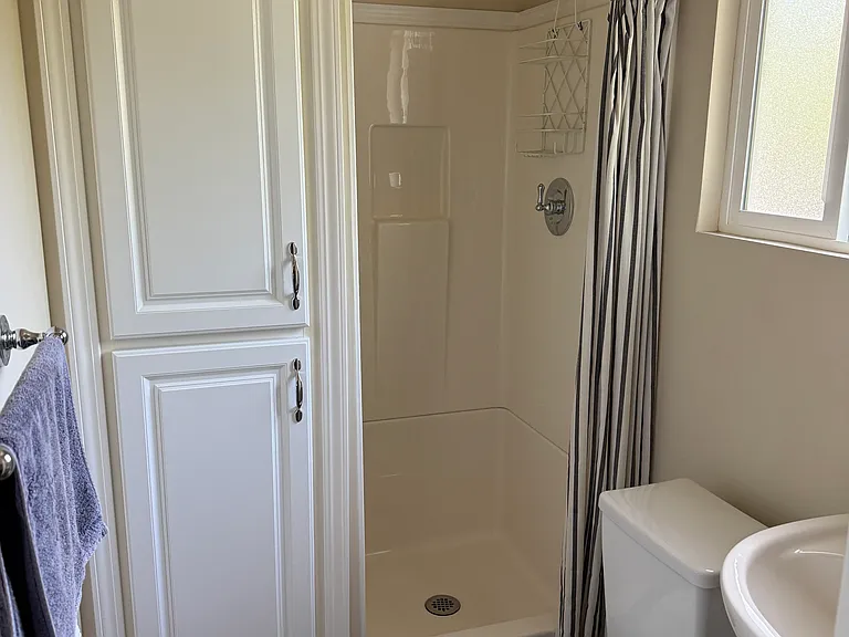 small bathroom off of laundry room