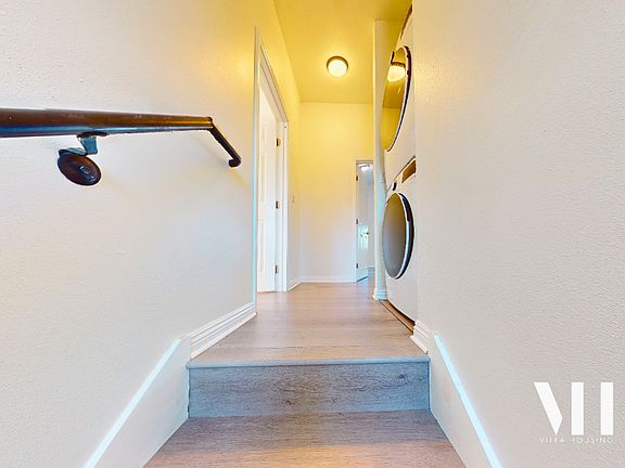 Hallway leading to bedrooms. Full size Washer & Dryer Included