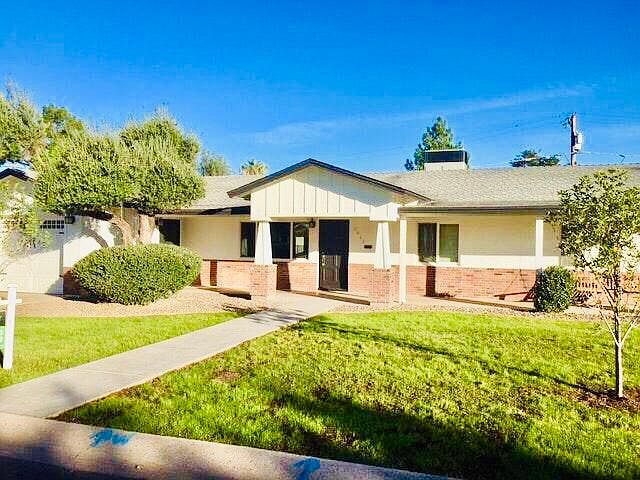 Charming craftstman style front of the home. Ample window space! Front yard living.