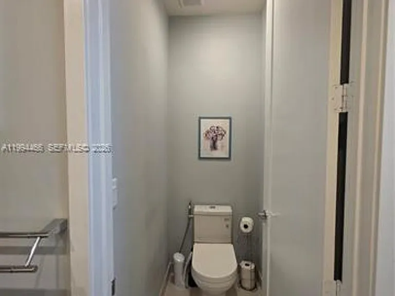 10222 NW 64th Way #302 — Photo 16