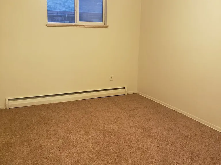 Spacious unit in Lakewood featuring abundant natural light and a central courtyard — Photo 12