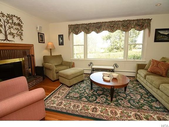 Large front window. Sun filled room.