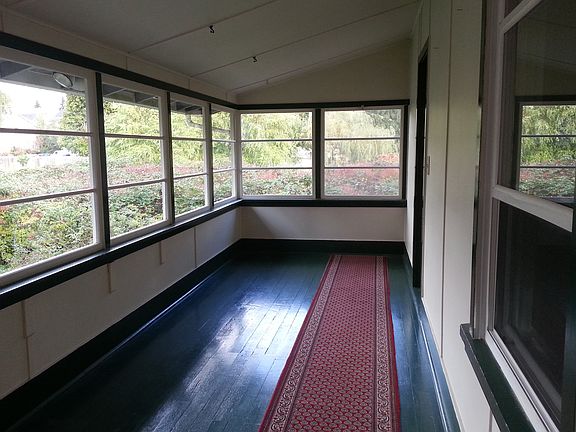 Sun-room from front door leading to Living room