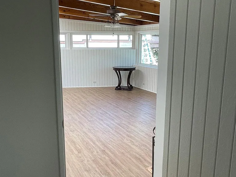Private doorway from bedroom to family room