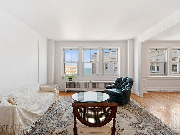 The living room flows into the dining room to the