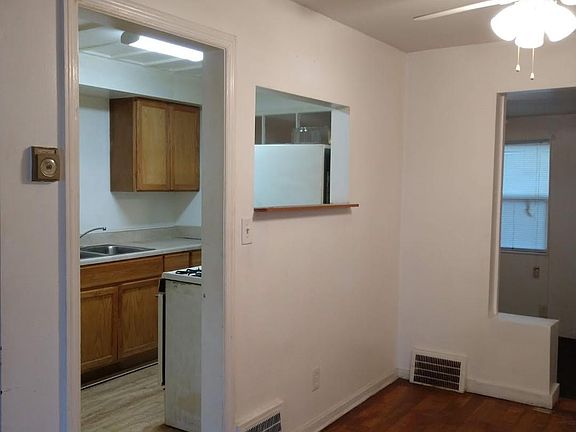 Open View Kitchens have Stove, refrigerator, and microwave.