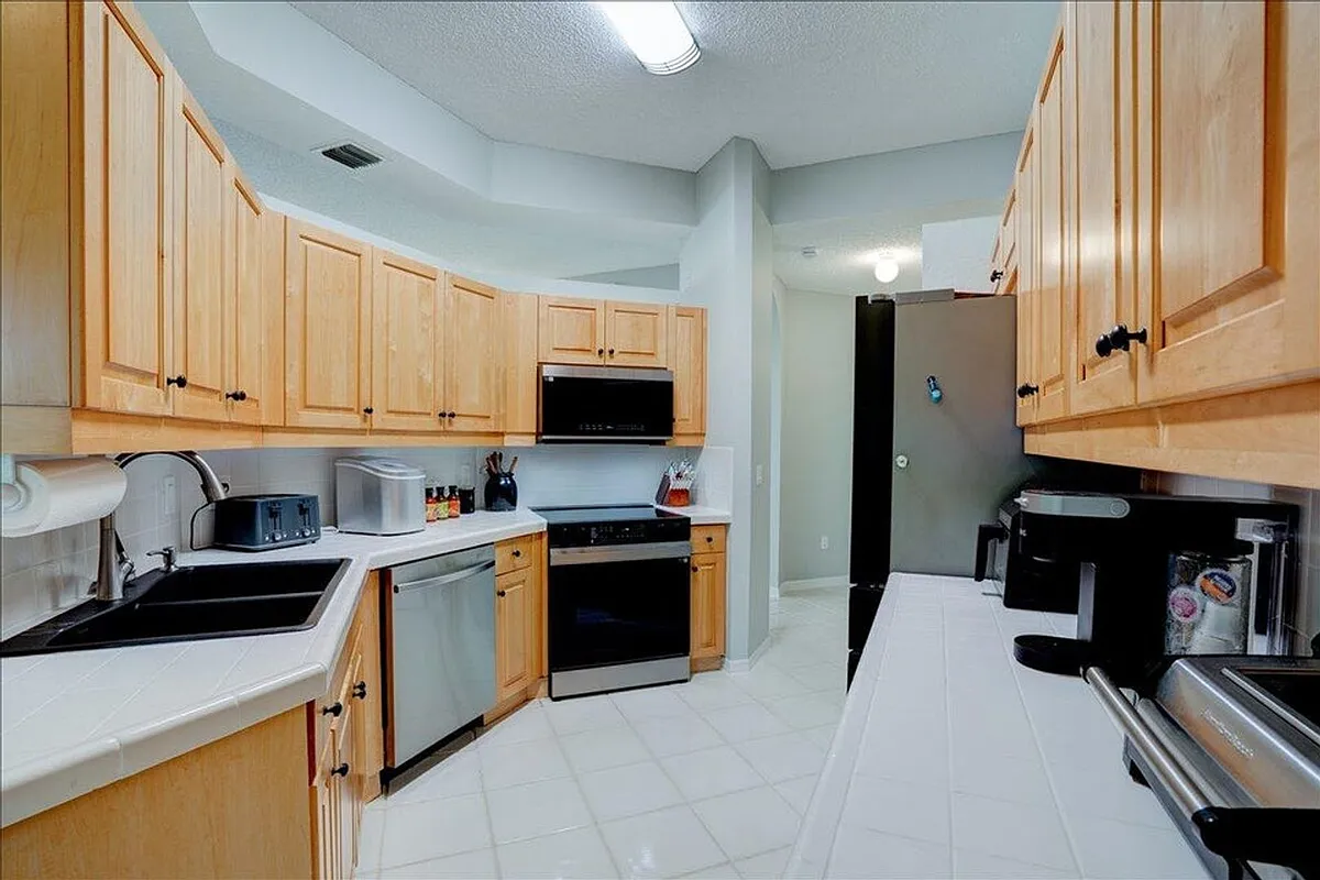 Building Photo - 10173 Andover Coach Cir #G2