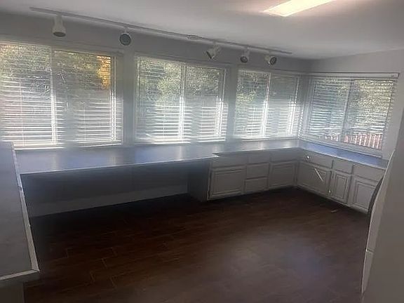 Office with view of backyard and creek.