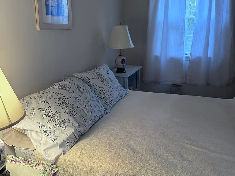 Bedroom 2. Peaceful view of side and back yard.