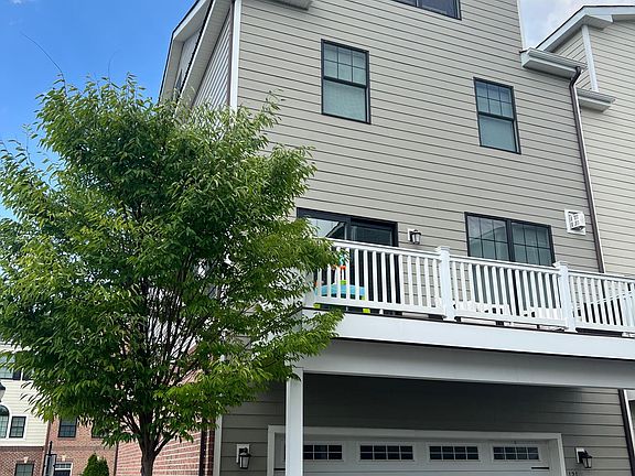 2 car garage and generously sized outdoor patio above it