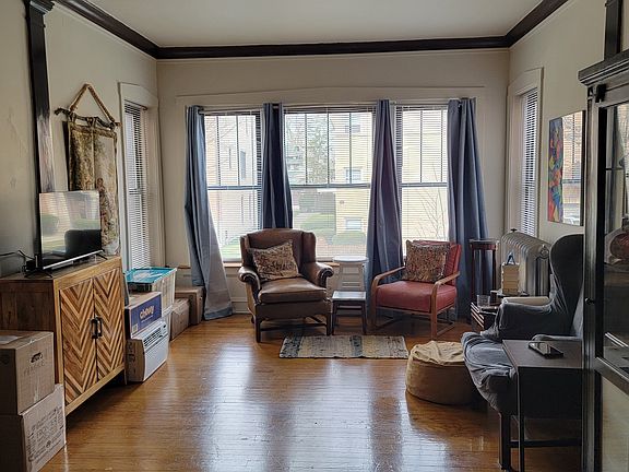 Living room/sleeping area with furniture