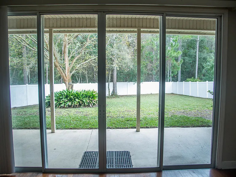 Looking out into the fully fenced backyard