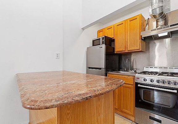 5th image of 64 E 129th St APT 2
