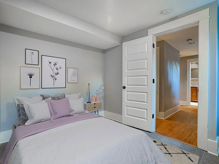 Bedroom 6. This image shows a virtually furnished space. Bedrooms come unfurnished.