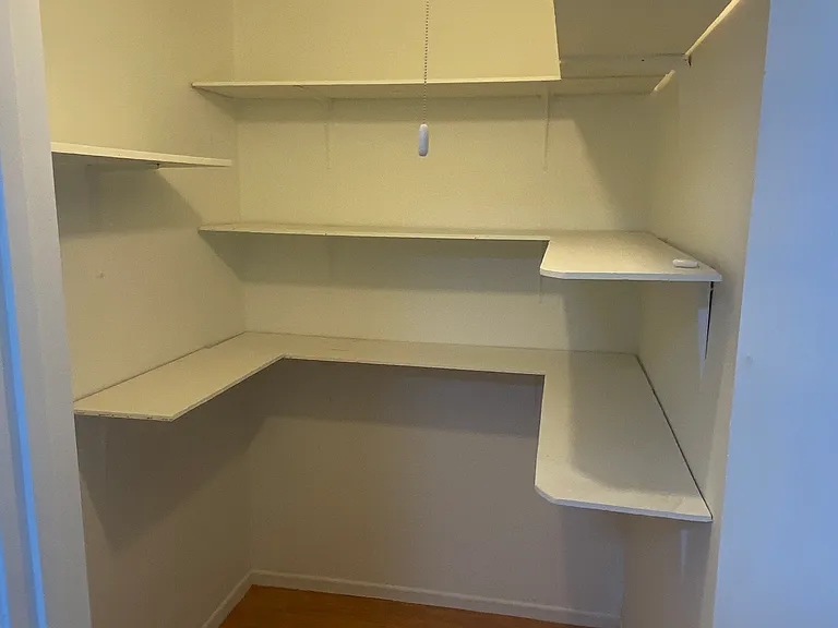 Walk-in pantry just off of laundry room / kitchen.