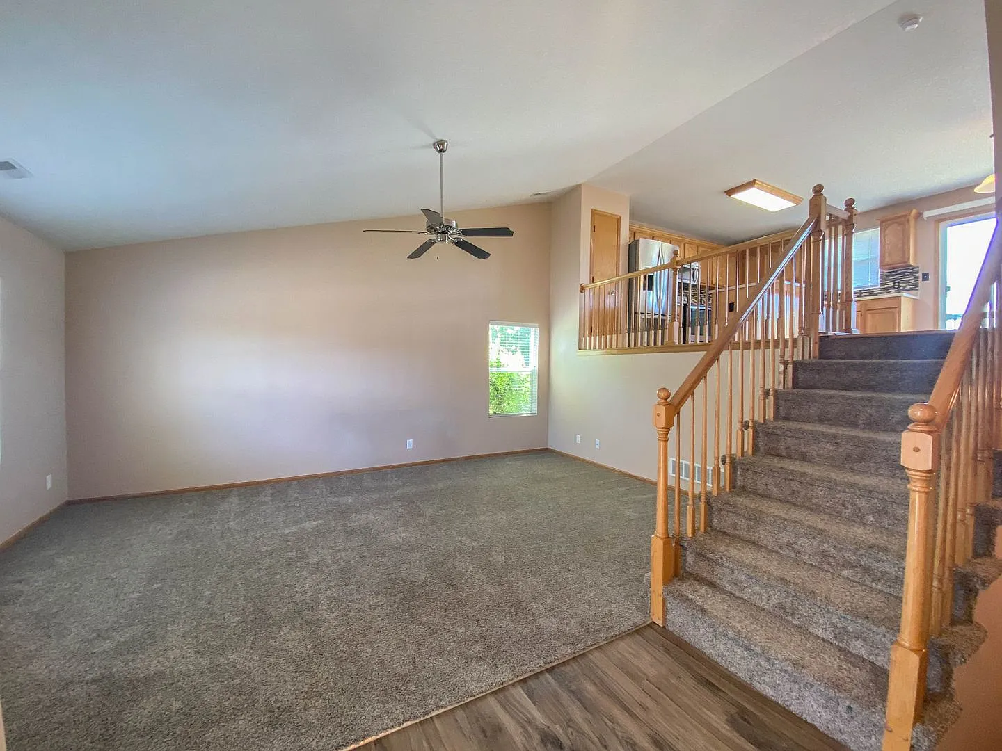 Spacious 3-Bedroom Waukee Home with Fenced Yard, Deck & 2-Car Garage — Photo 2
