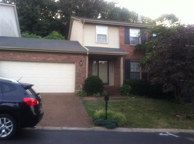 Front of Condo with 2-car garage