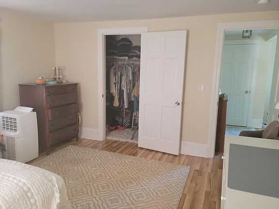 Walk in closet with shelving