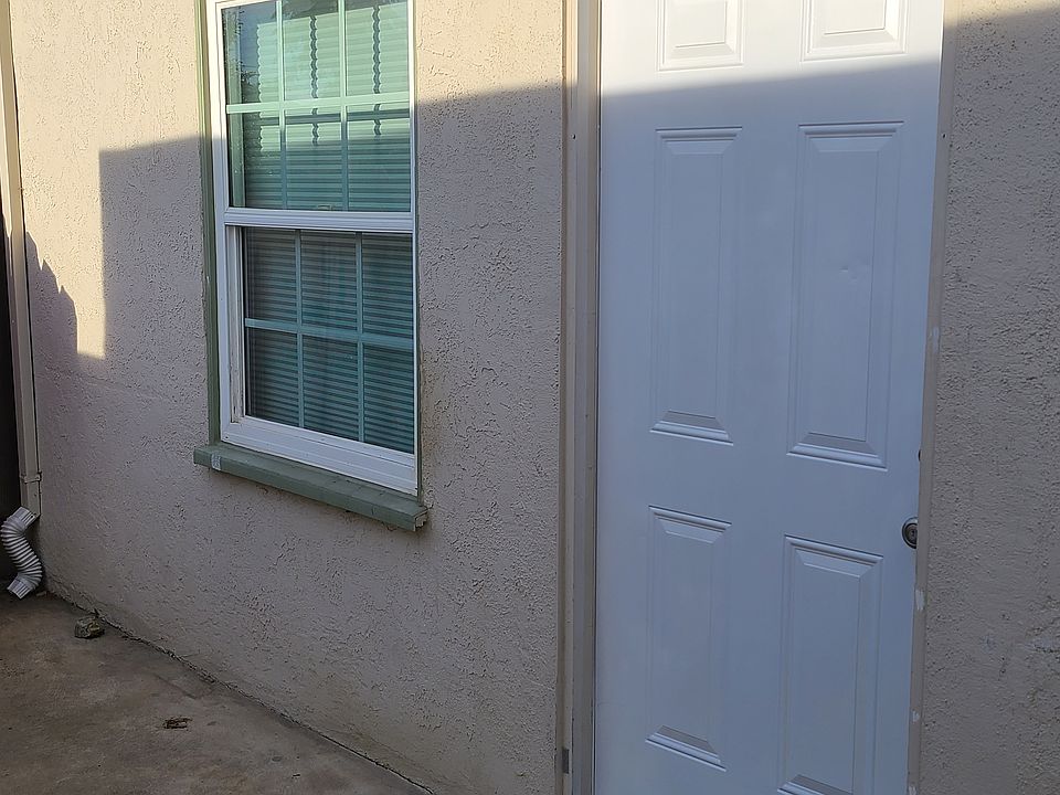 Entrance to the studio, between our house and the neighbor's