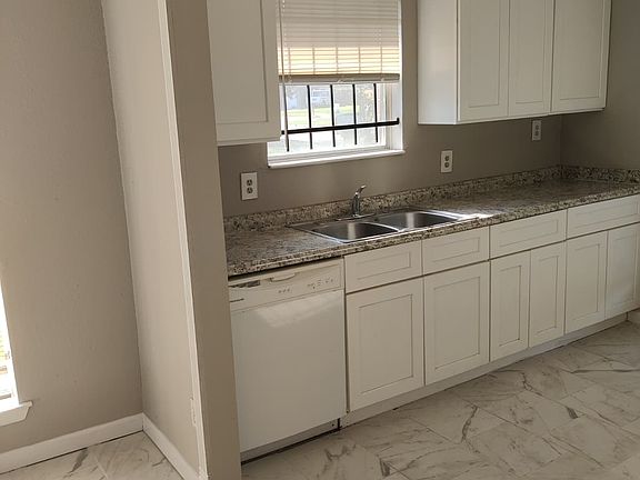 Kitchen, Sink Side. All upgraded 40" white shaker cabinets