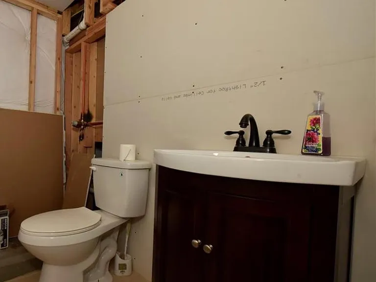 Half bath in basement.