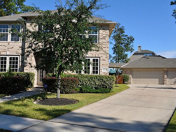 Oversized 3 Car Garage + 10ft. Extension w/extra outlets and partially decked attic