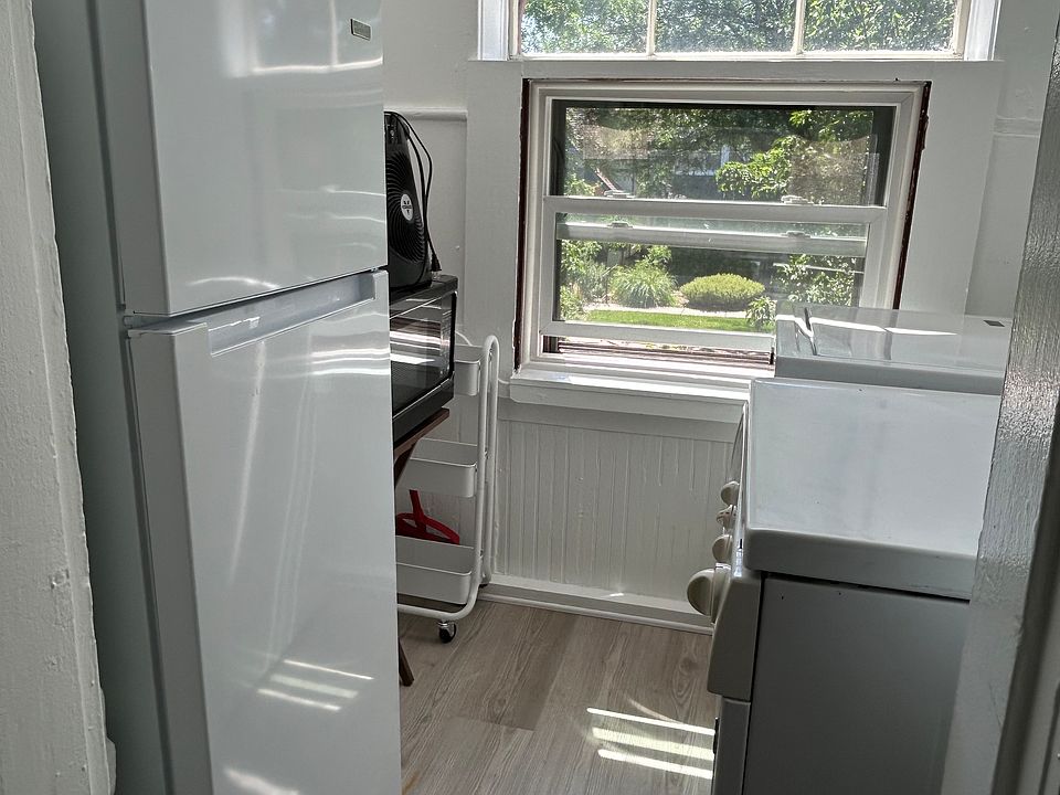 Pantry, refrigerator, microwave, washer and dryer.