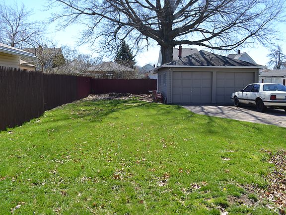 Fenced yard and drive