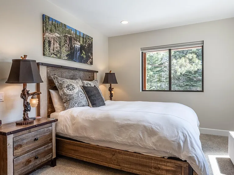 Second bedroom with a view of the outdoors