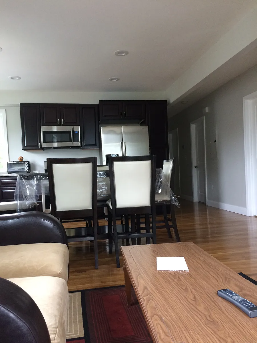Large open living and dining area with natural light - Eleanor St