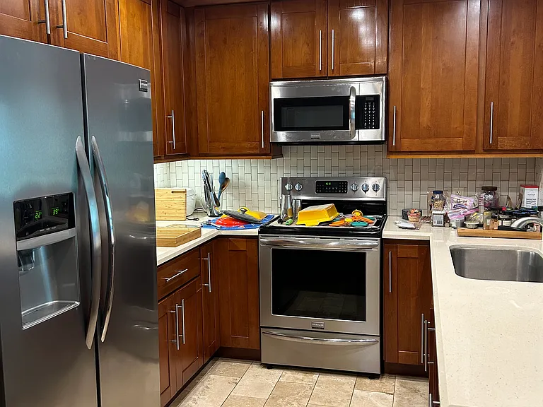 Refrigerator has since been replaced with a newly updated french door refrigerator. Microwave also recently updated