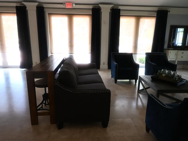 8721 Wiles Rd #305 — Photo 60