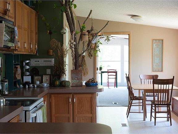 kitchen, breakfast nook, den with old floors