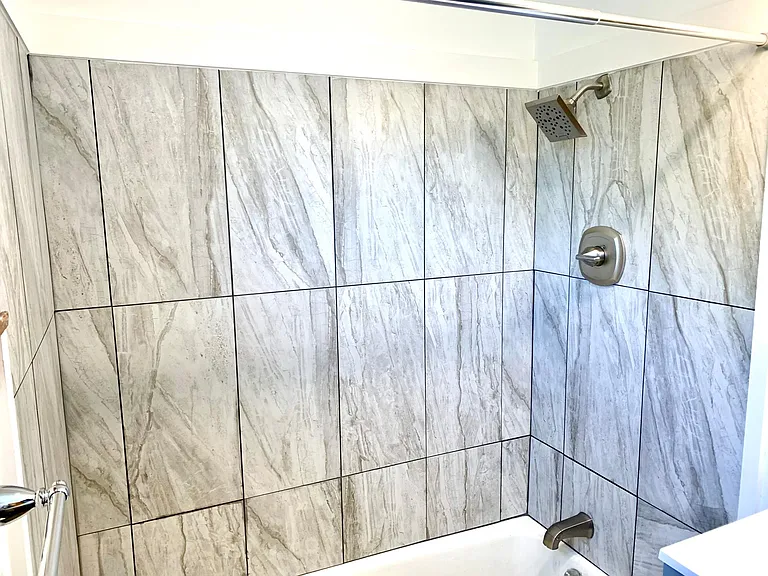 Newly tiled tub surround
