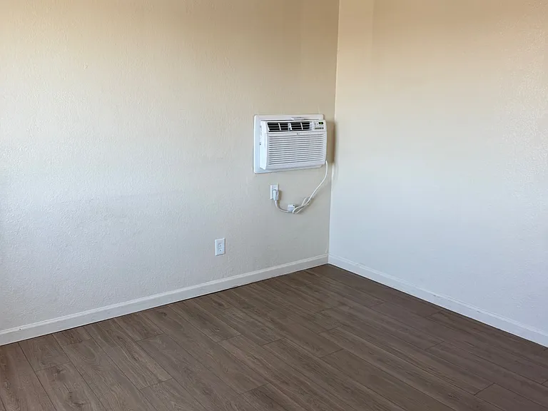 Wall air conditioner in bedroom