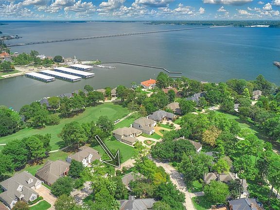 Located on a shaded corner lot in the Master Planned community of Bentwater.