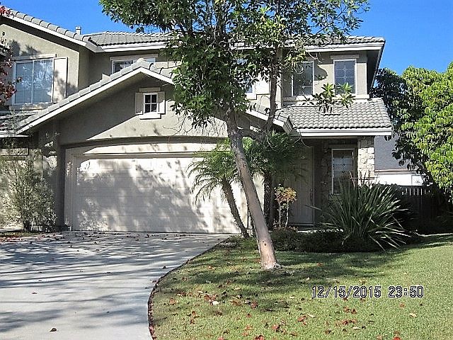 Exterior with long driveway for extra parking