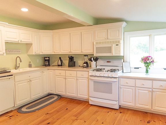 Spacious kitchen with beautiful hardwood floors