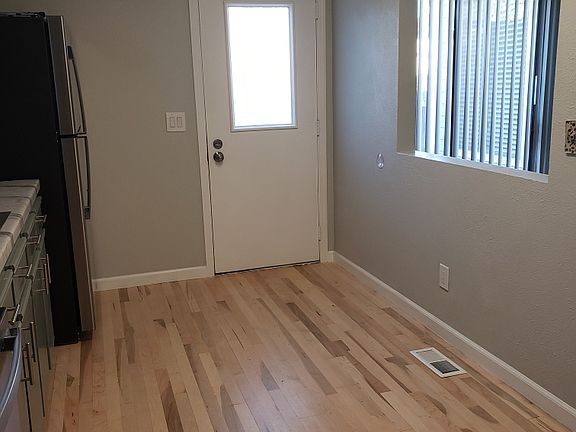 DOOR TO SIDE YARD, FROM KITCHEN.