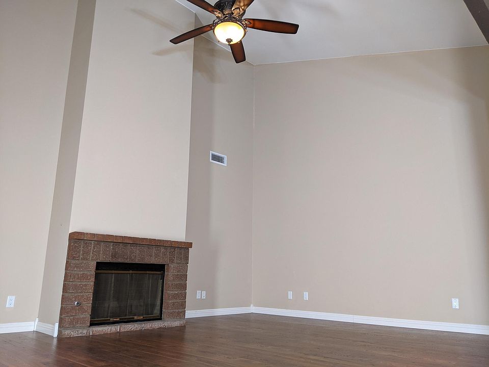 Family Room with Gas Fireplace and Ceiling Fan