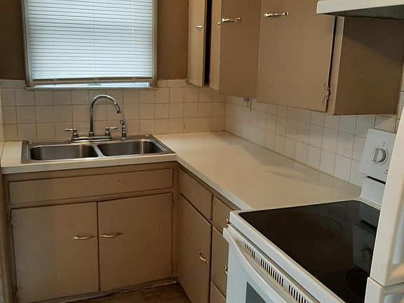 Kitchen looking toward south; Utility room is out of view, on the left