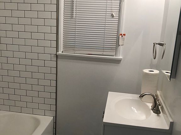 Bathroom with white subway tile