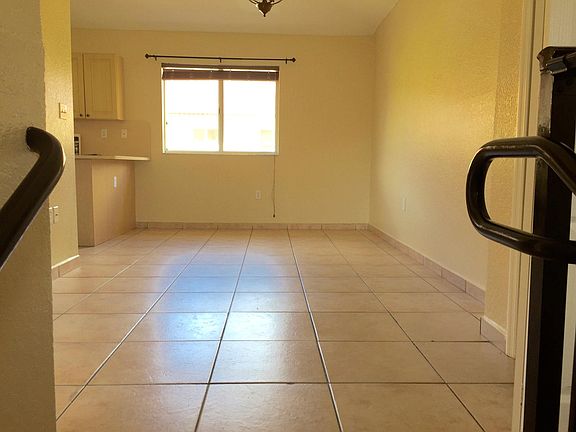 Living Room / Dining Room with storage closet.