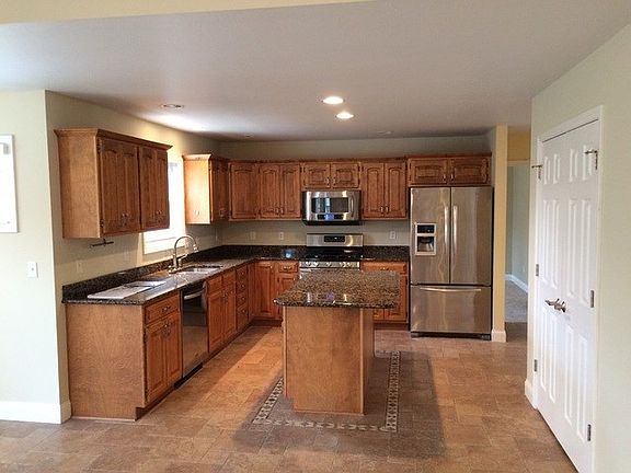 Many cabinets, stainless appliances remain!
