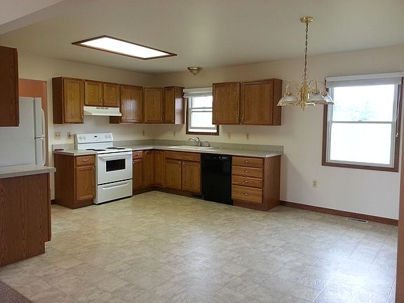 Spacious kitchen with dining
